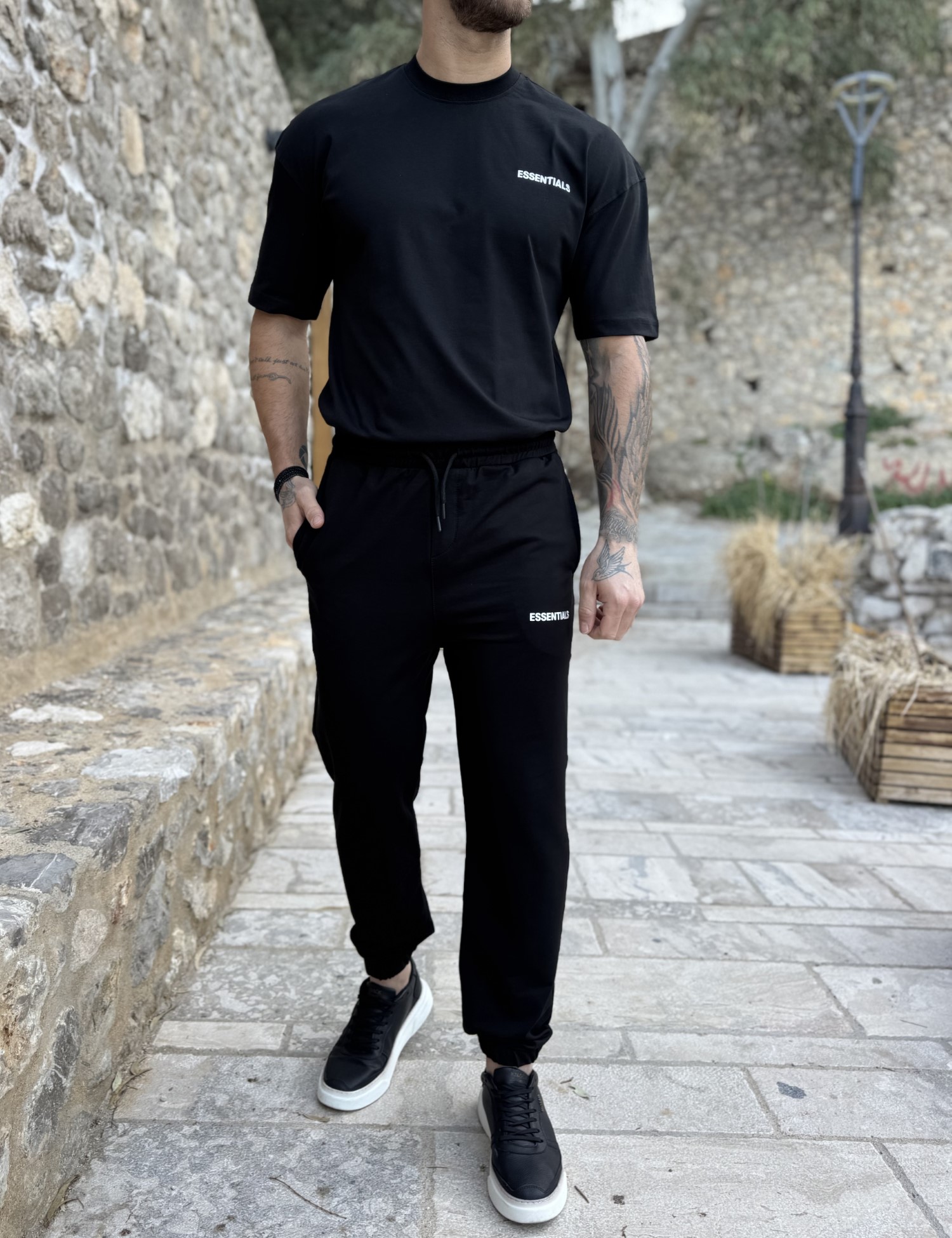 Ανδρική μαύρη φόρμα με λάστιχο και λογότυπο στο πλάι ES302M φωτογραφία